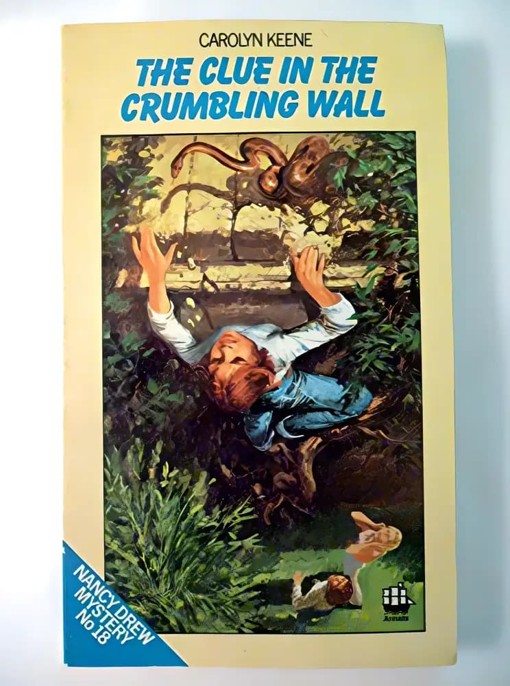 Book cover of 'The Clue in the Crumbling Wall'